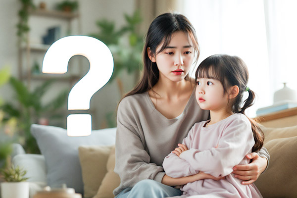 疑問に思う子供と母親